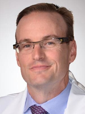 J. Doucette, MD